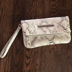 Jennifer Lopez snake skin clutch